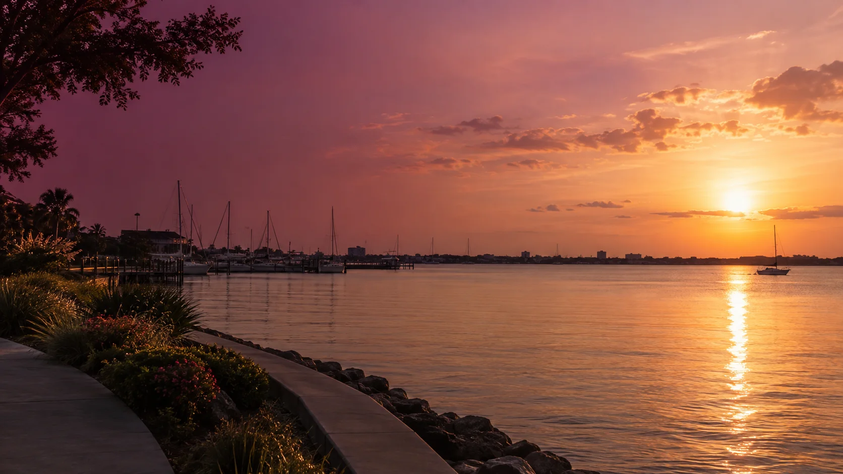 Waterfront and marina silhouettes at sunset